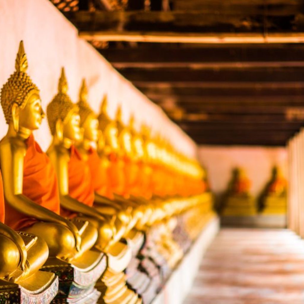 golden buddha in ancient temples